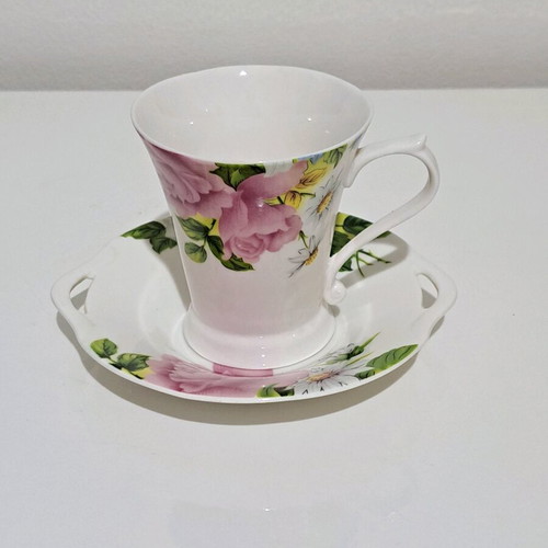 Porcelain cup and saucer set like new