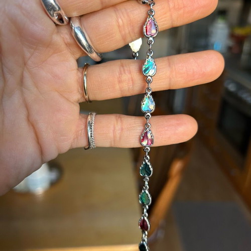 Bracelet with abalone shell inlays like new, silvertone leaf design