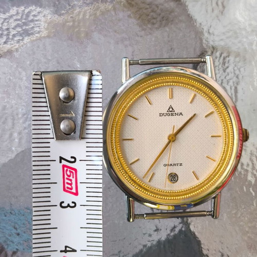 Dugena men's quartz watch like new with gold bezel
