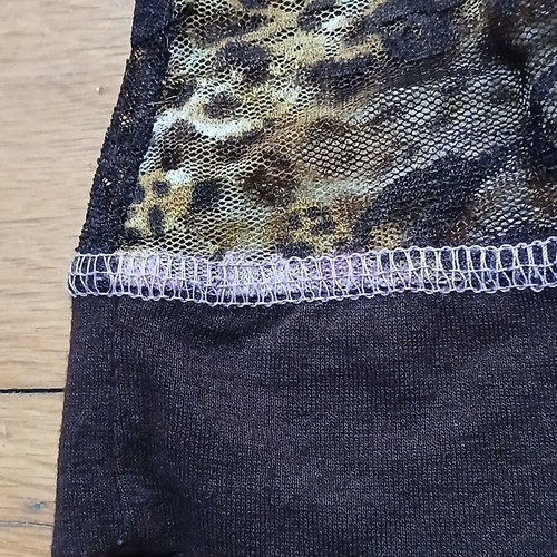 Batic sleeveless floral women's top with mixed animal print, like new, size M