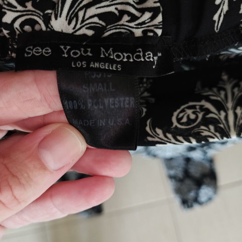Flowy pants with black and white pattern, size S