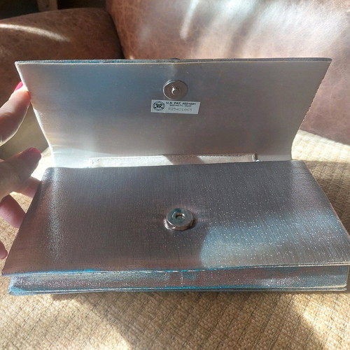 Vintage silver envelope hand bag like new with strap