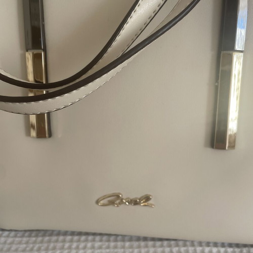 Axel shoulder bag like new, cream color