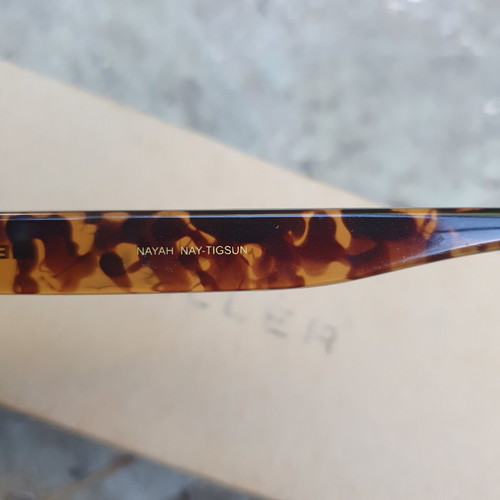 Meller Nayah sunglasses used, tiger yellow colorway