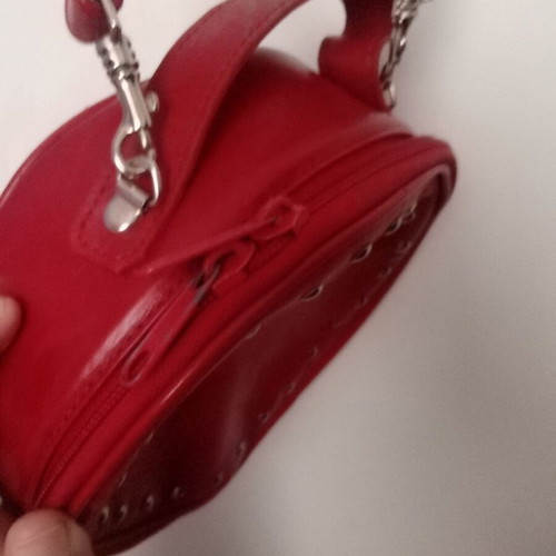 Leather crossbody bag red used with studs and shoulder strap