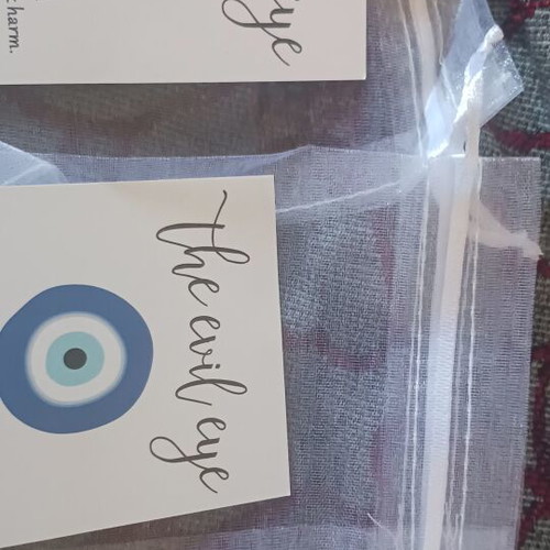 Set of 2 blue evil eye keychains with card and transparent pouch