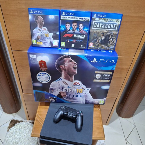 PlayStation 4 Slim 1TB like new with 3 games and controller