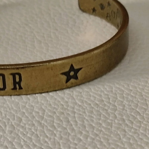 Christian Dior brass cuff bracelet like new, gold tone