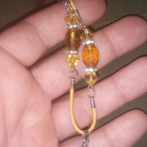 Handmade necklace with amber beads and leaf pendant
