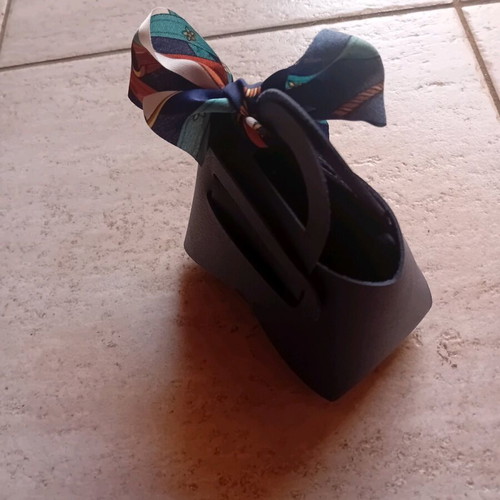 Gift packaging bag made of artificial leather new, blue with ribbon