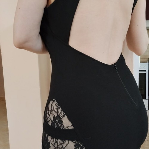 Black mini dress like new with open back and lace slit
