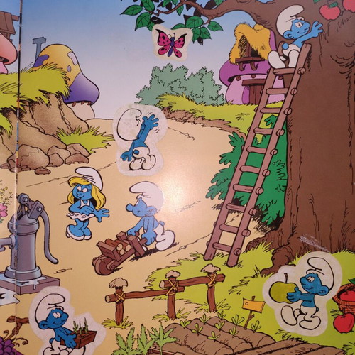 Smurfs book used with all stickers attached