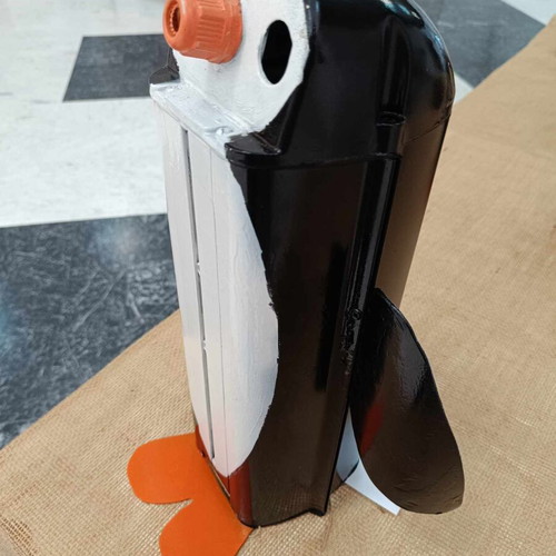 Decorative penguin like new made from recycled CCTV camera