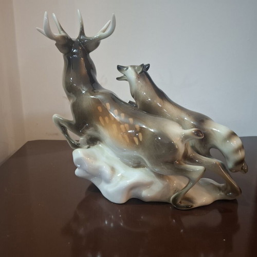 Royal Dux Bohemia porcelain figurine like new, deer and wolf scene