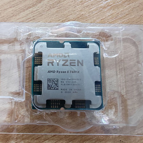 AMD Ryzen 5 7600X processor with cooler like new