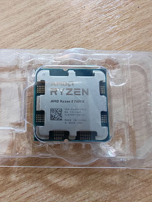 AMD Ryzen 5 7600X processor with cooler like new