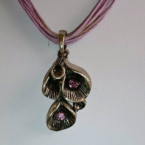 Necklace new with leather cords and silver, design with purple strass stones