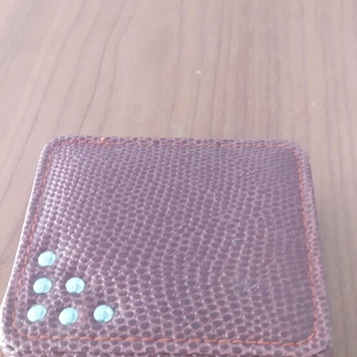 Windproof lighter new in leather-type case, unused