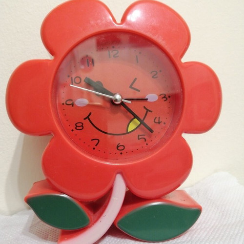 Flower alarm clock used with second hand, battery operated