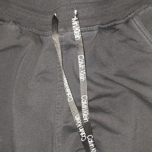 Calvin Klein black sweatpants, size L