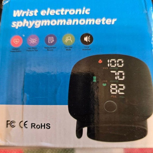 Wrist Electronic Blood Pressure Monitor new with case and rechargeable battery
