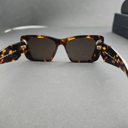 Prada sunglasses used with original box and case