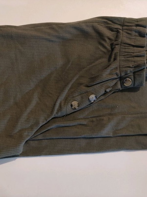 Khaki/Olive pants like new, small with elastic waist and wide leg buttons
