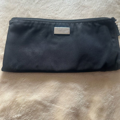 Gucci wallet used, black with zipper and compartments