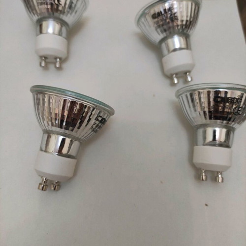 Set of 4 Halogen GU10 50W bulbs used, functional