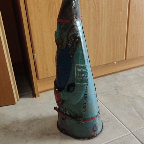 Handmade decorative figure of a gnome from recycled iron like new