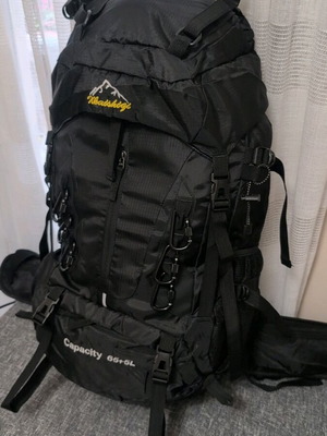 Hiking backpack 65+5L new with ergonomic support and multiple pockets