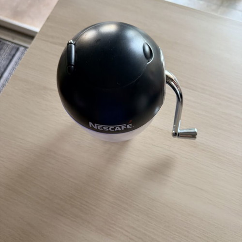 Nescafé manual ice crusher used, one lid ear broken