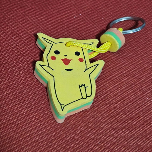 Pikachu keychain used, yellow
