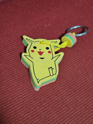 Pikachu keychain used, yellow