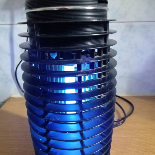 Electric insect trap used, black color, fully functional