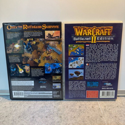 Warcraft PC games set used, Warcraft 2 Battle.net Edition no manual, Warcraft 3 with manual