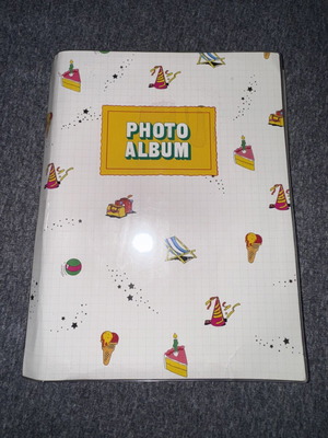 Photo album for 64 photos used with some imperfections