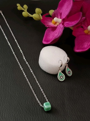 Stainless steel necklace and earrings set with tear eye design