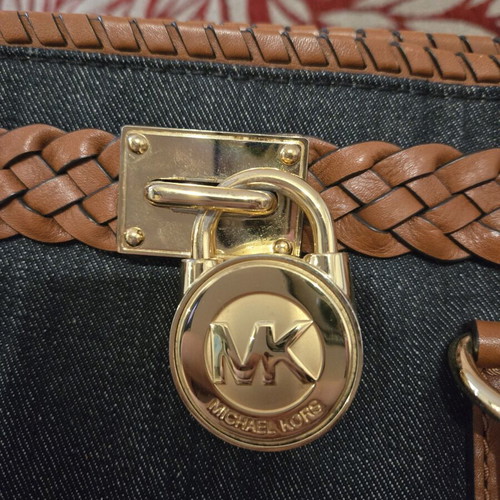 Michael Kors Denim Hamilton handbag used with leather details and gold lock