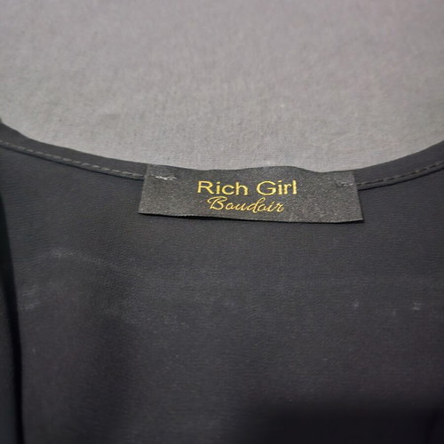 Rich Girl black mini wrap dress with iridescent sequins