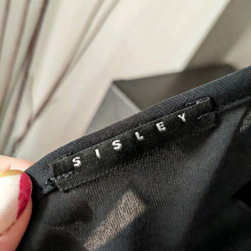 Sisley top like new, black, backless and semi-transparent