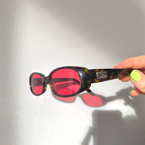 Gucci sunglasses used with red/pink lenses