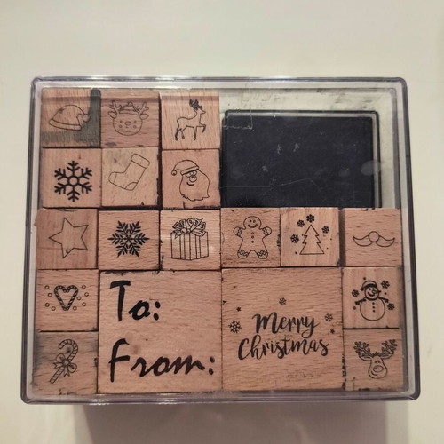 Craft set with wooden Christmas stamps used