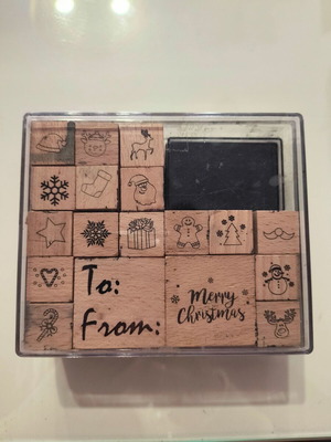 Craft set with wooden Christmas stamps used