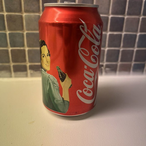 Coca Cola Woman collectible used, empty can