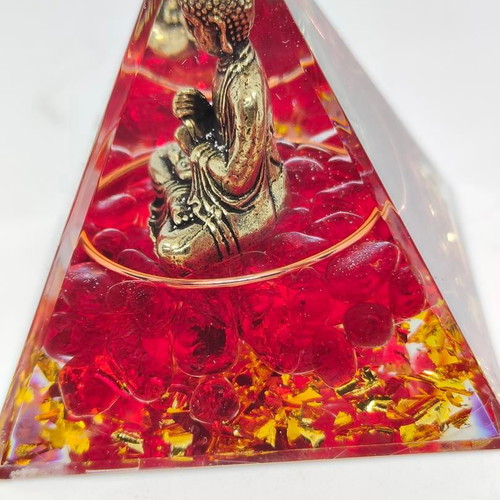 Orgonite pyramid with Buddha and red quartz like new