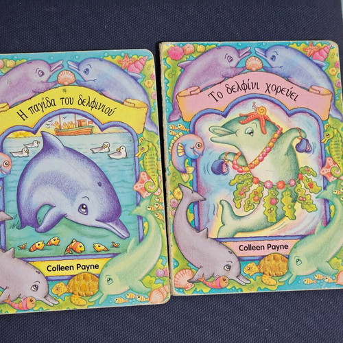 Dolphin books used, set of 2