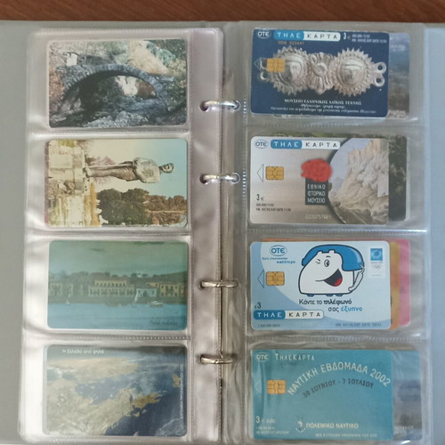Phone card collection used, 42 pieces with album