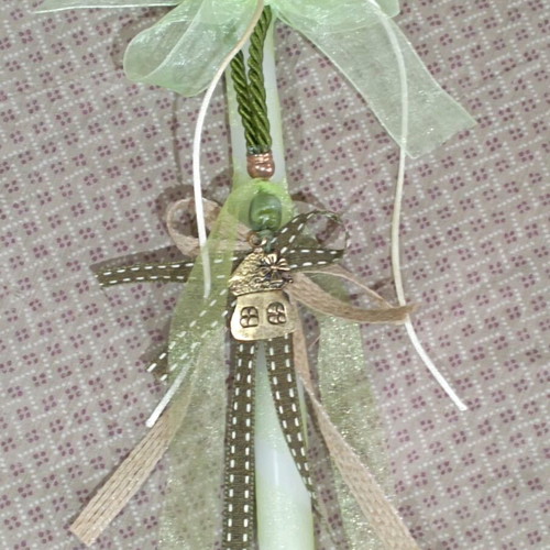 Handmade candle like new, light green with decorative house