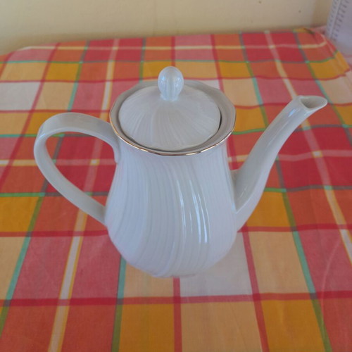 Porcelain tea set 9 pieces used, classic elegant design